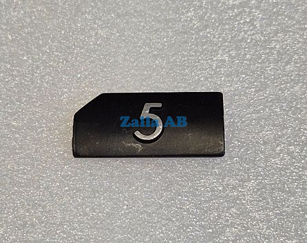 PRESSEL,RELIEF BLACK SYMBOL 5